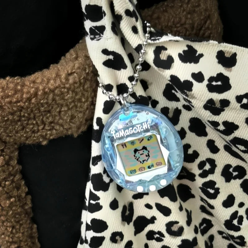 Evolution Tamagotchi – Porte-clé électronique original, jouet rétro cartoon, animal virtuel évolutif pour enfants et collectionneurs